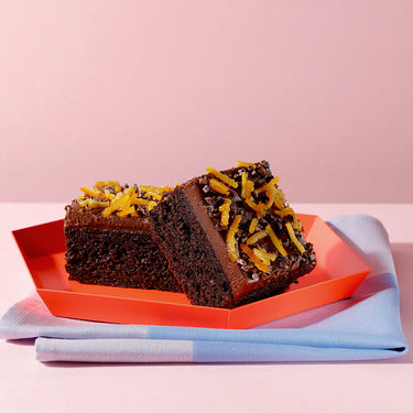 Two slices of our delicious vegan chocolate joy traycake